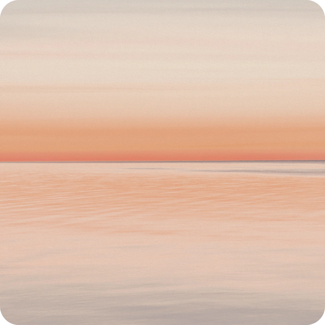 A warm sea horizon at golden hour
